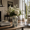 Vintage Necked Vase 31cm ceramic with blue floral pattern and weathered finish, holding white blooms.