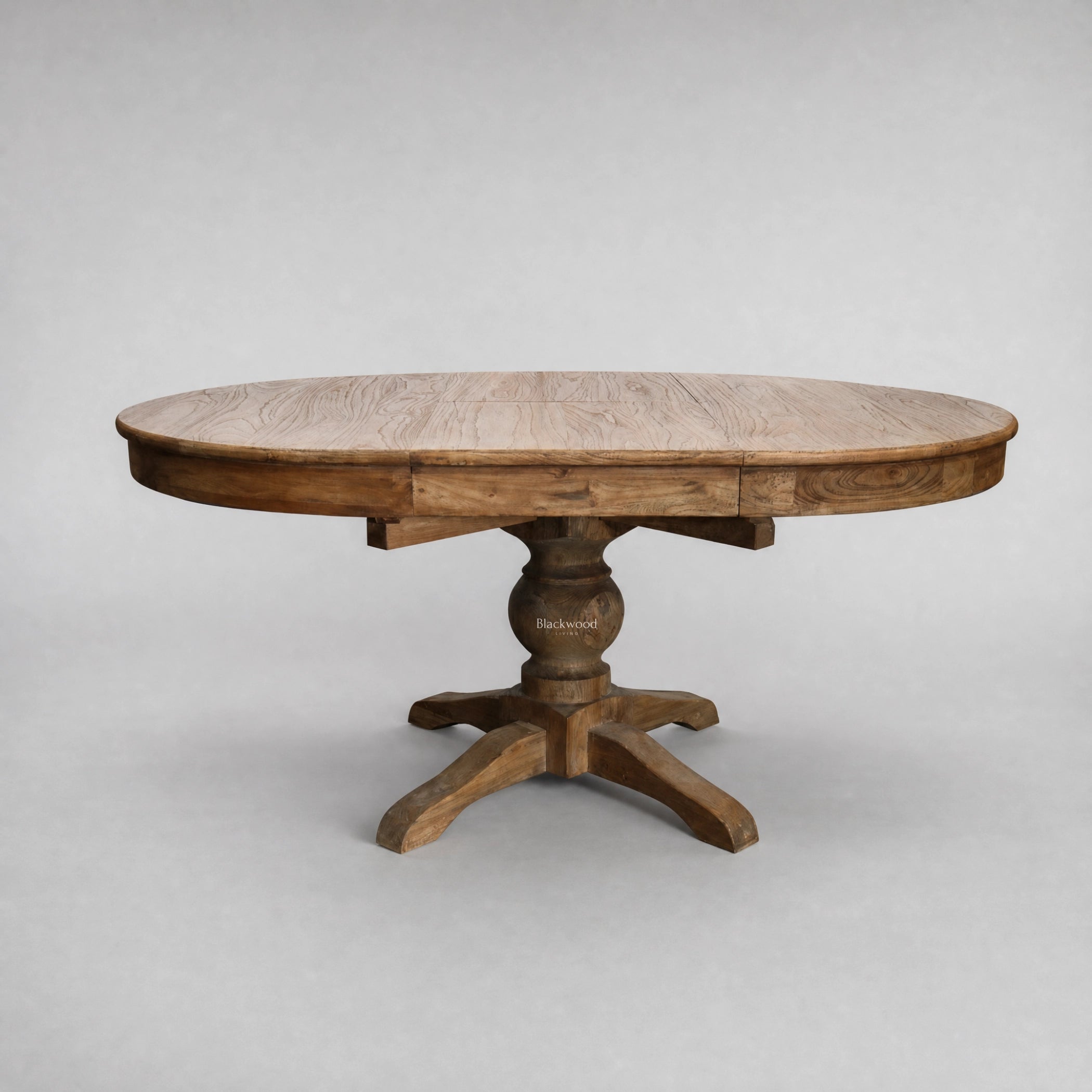 Woodland Extendable Dining Table, reclaimed elm, round form with time-worn texture for everyday gatherings.