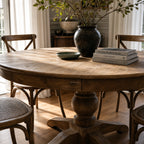 Woodland Extendable Dining Table in reclaimed elm with a round form for everyday gatherings.