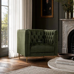 Wellington Club Chair in green velvet with deep tufting and slim brass legs.