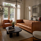 Wellington Club Sofa in genuine leather with button tufting; softens and develops a patina.