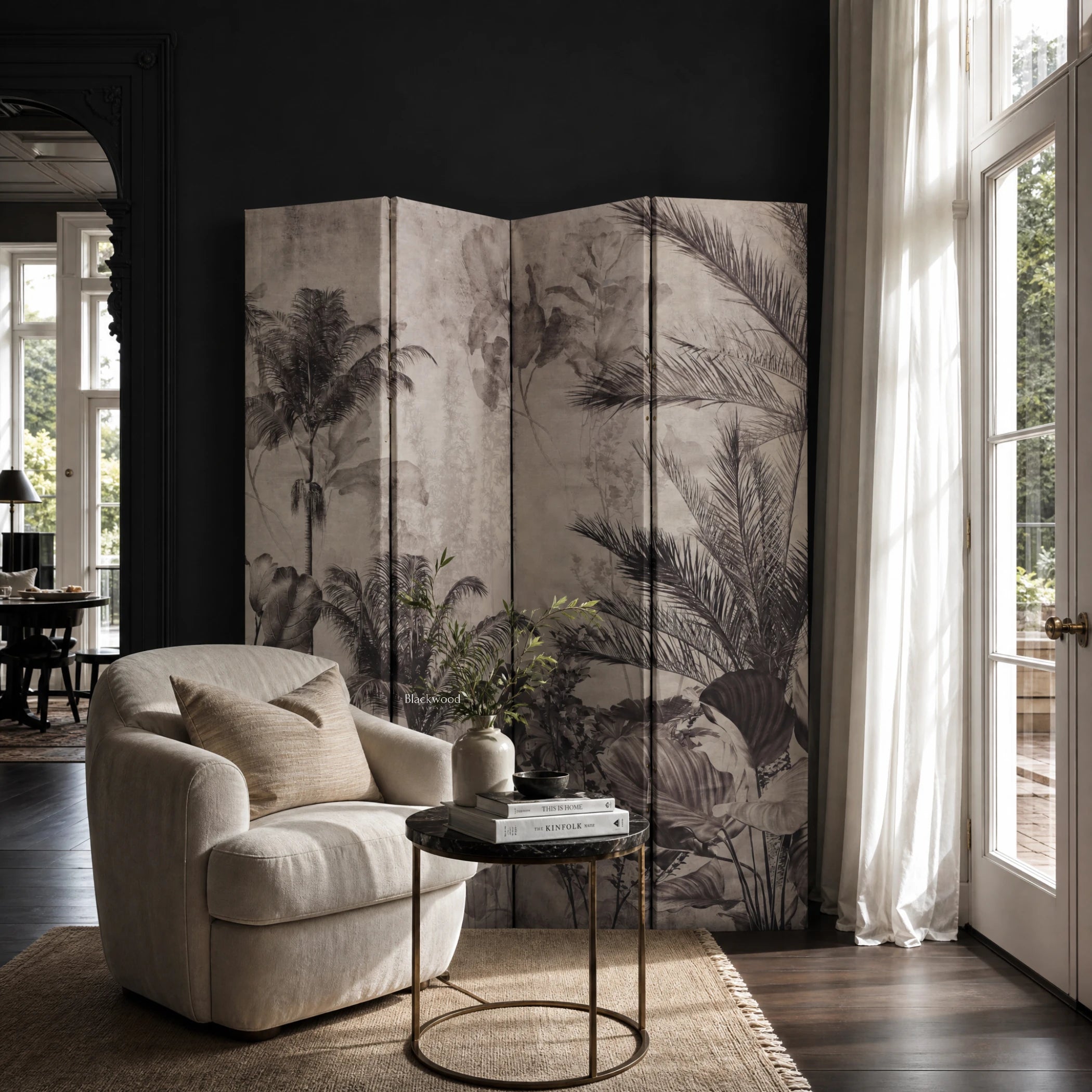 Palm Room Divider with a grayscale tropical palm print on canvas framed in wood, set in a dark-walled living room.