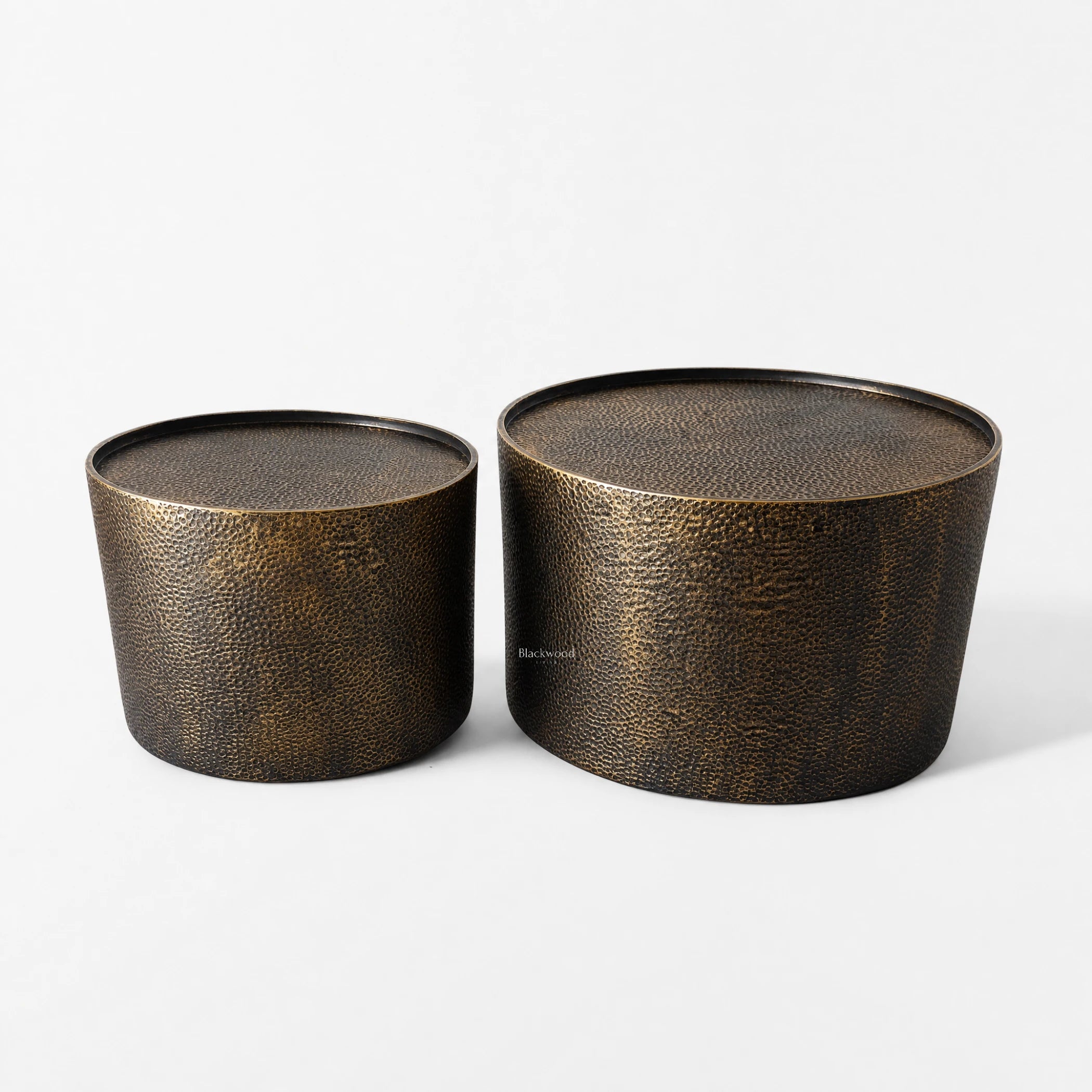 Foundry Table Duo, antique gold iron with a hammered texture, a pair of side tables.