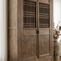 Eastwind Cabinet in weathered reclaimed elm with lattice doors and sturdy, timeless design