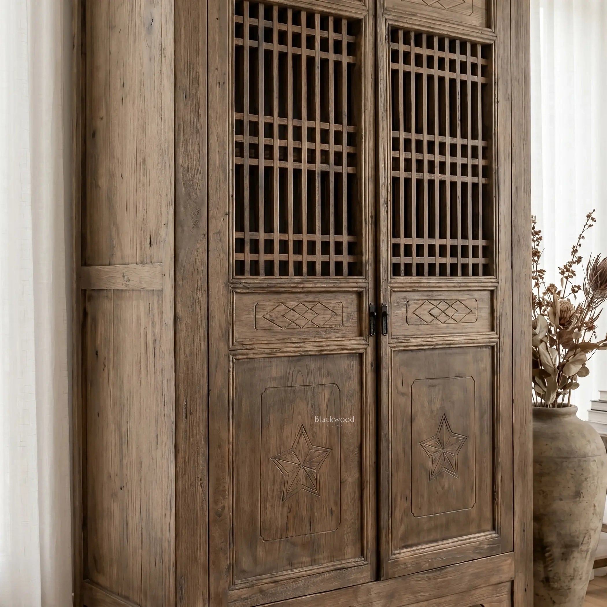 Eastwind Cabinet in weathered reclaimed elm with lattice doors and sturdy, timeless design