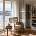 Whitehaven Room Divider in distressed antique white mango wood with shutter panels in a Hamptons-inspired coastal space
