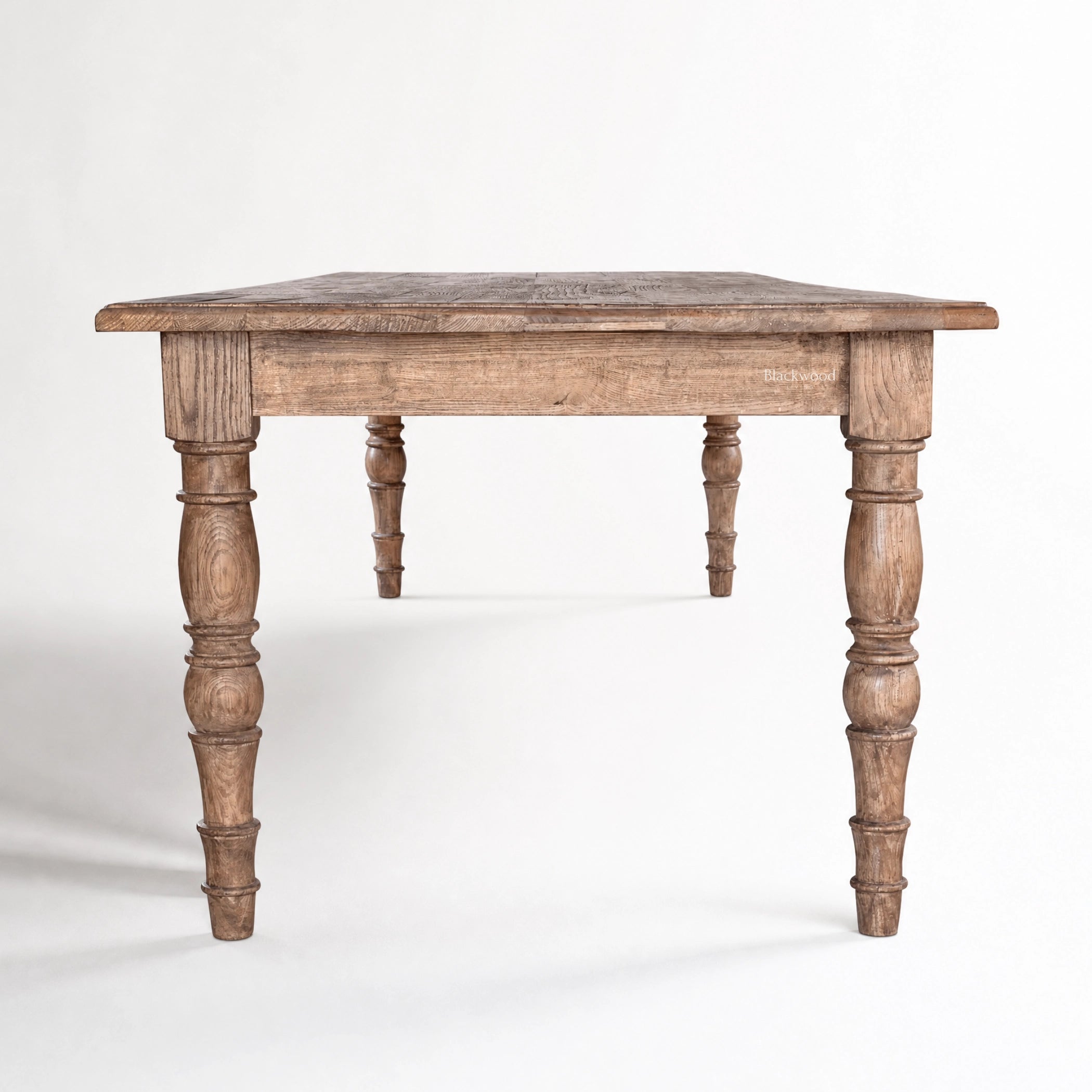 Provence Dining Table crafted from reclaimed elm with a 3-metre length, weathered finish and traditional turned legs.