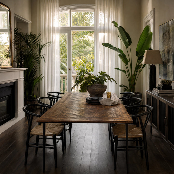Havana Dining Table, reclaimed mango wood with walnut finish and distinctive grain, in a sunlit dining room.