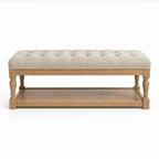 Oakfield Bench with sculpted oak frame and tufted beige upholstery, exuding welcoming, traditional style.