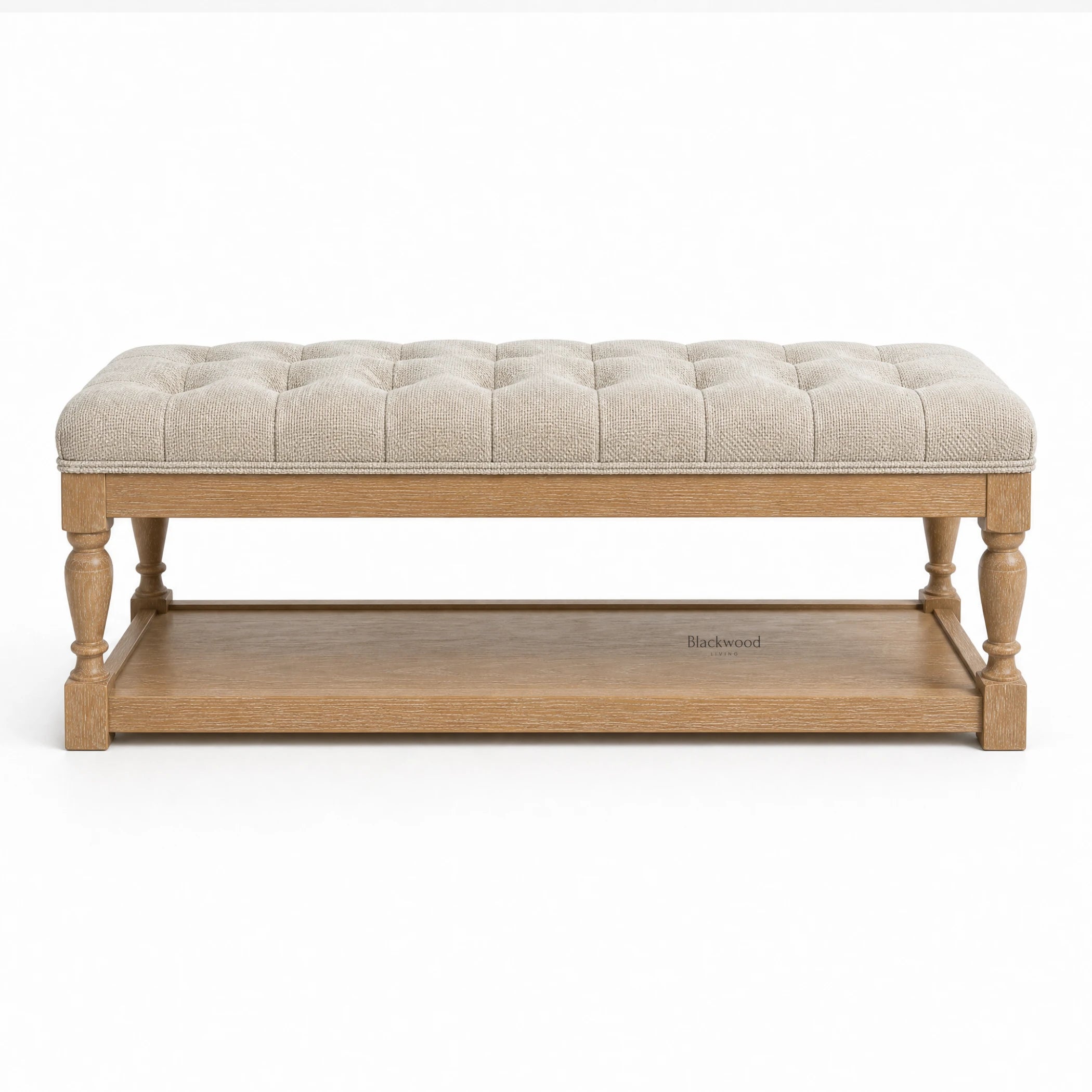 Oakfield Bench with sculpted oak frame and tufted beige upholstery, exuding welcoming, traditional style.