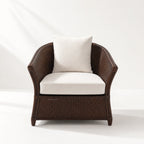 Havana Lounge Chair in cacao brown, handwoven rattan with double-layer construction and beige cushions.