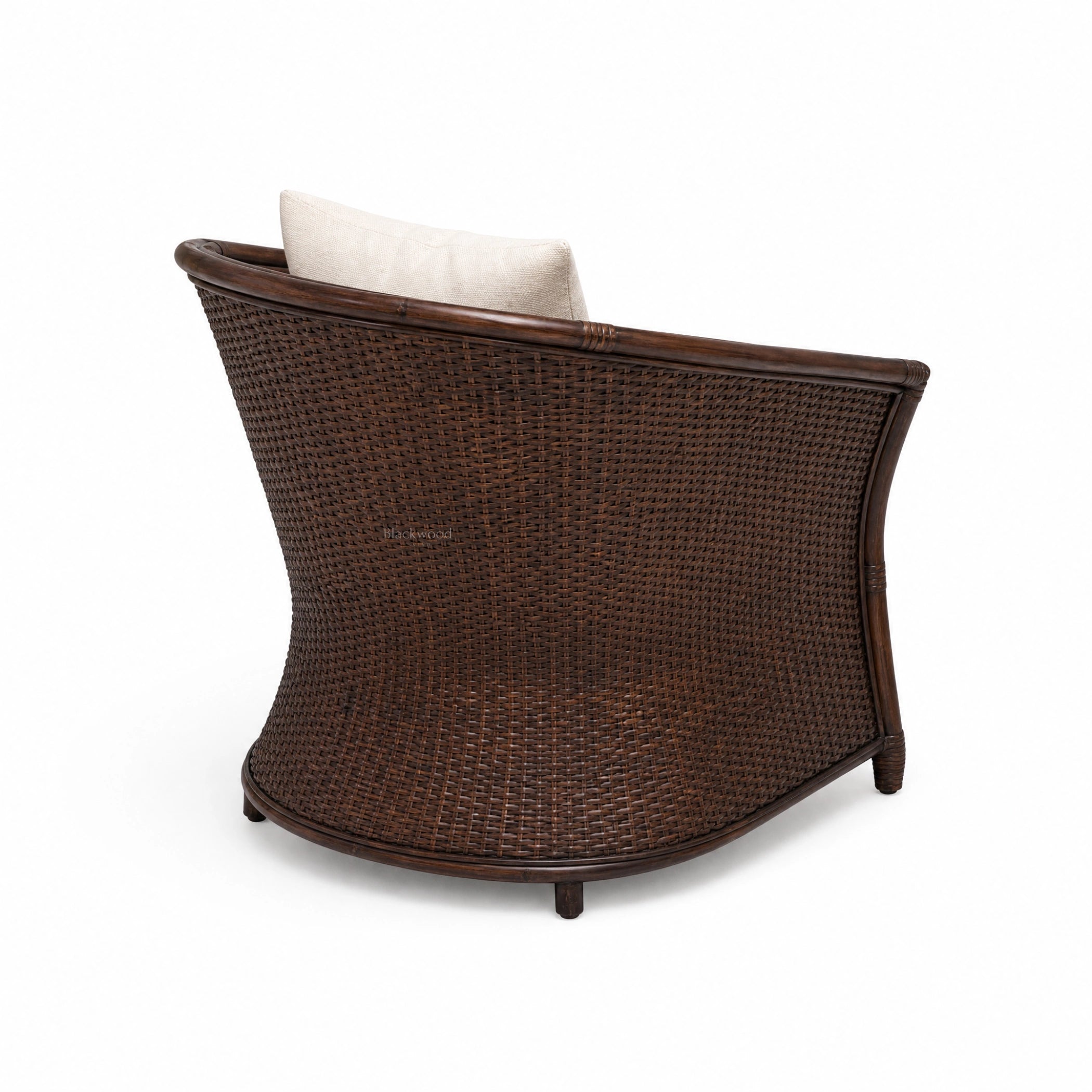 Havana Lounge Chair - Cacao, handwoven rattan with beige cushion and curved frame.