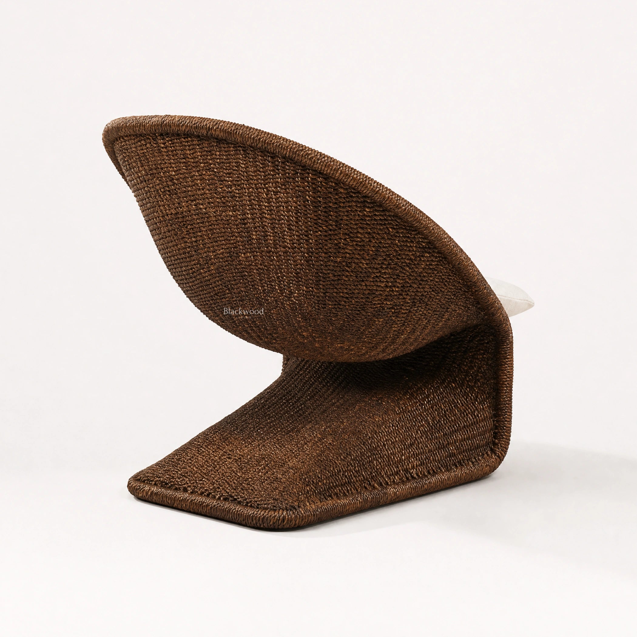 Calypso Lounge Chair - Cacao, handwoven water hyacinth rope with a curved silhouette.