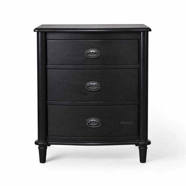 Thornfield Bedside Table with multiple drawers in a rustic black finish and metal ring pulls.