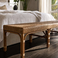 Sika Design Luis Bench in natural rattan with a woven top, 180cm long, in a bedroom setting.