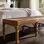 Sika Design Luis Bench in natural rattan with a woven top, 180cm long, in a bedroom setting.