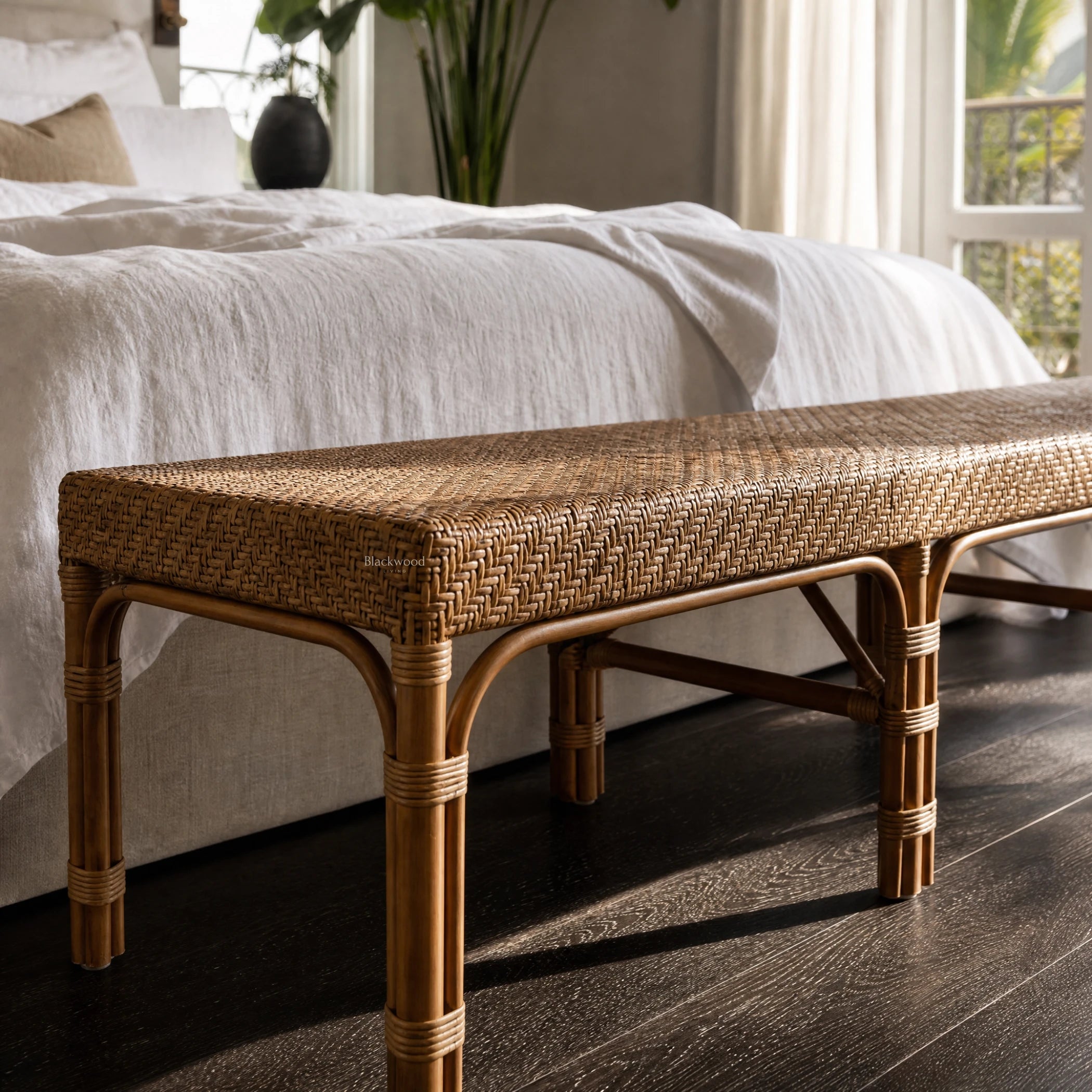 Sika Design Luis Bench in natural rattan with a woven top, 180cm long, in a bedroom setting.
