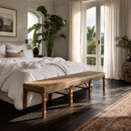 Sika Design Luis Bench, 180cm long, natural rattan, at foot of bed in sunlit neutral bedroom.