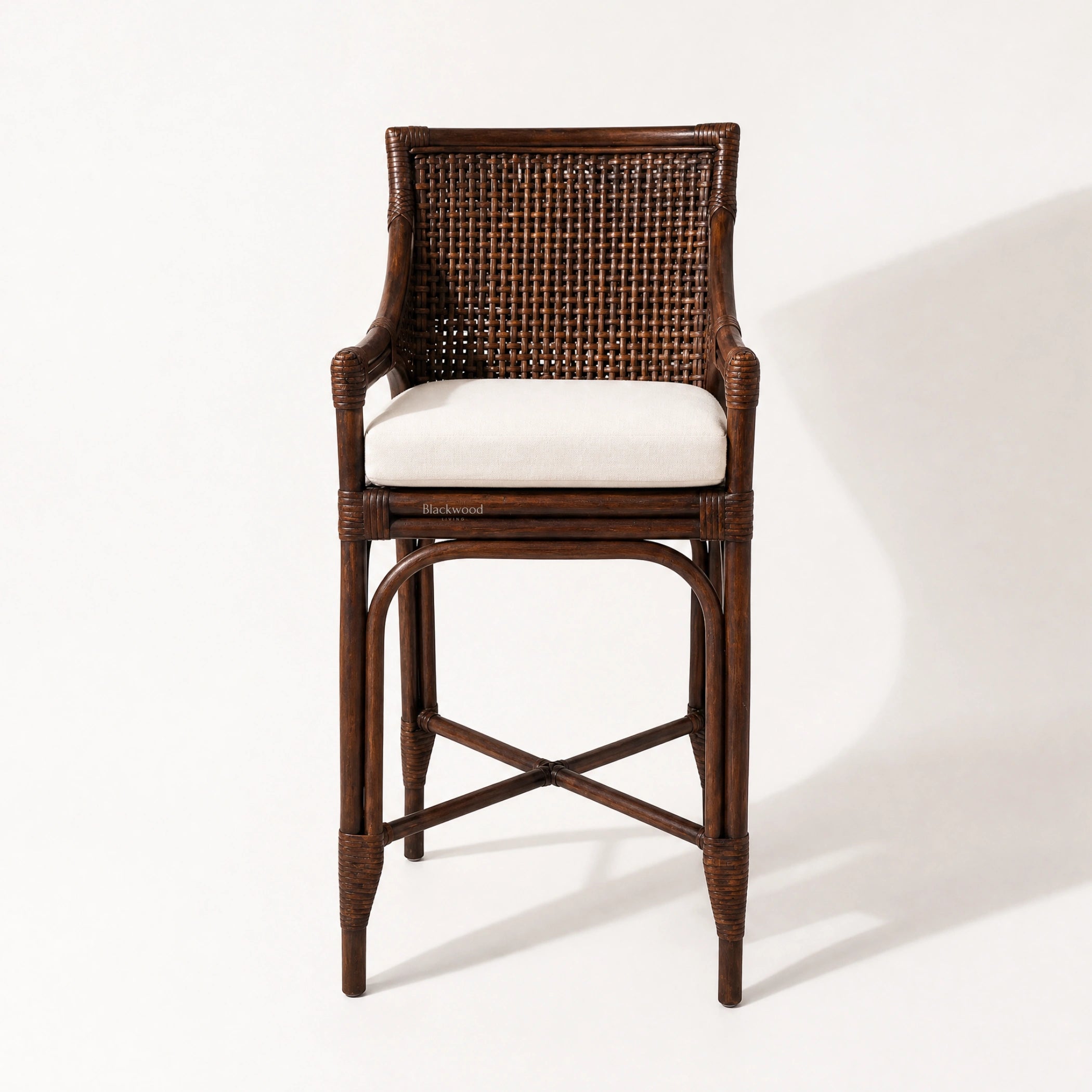 Havana Barstool with natural rattan weave, warm finish, and cushioned seat.