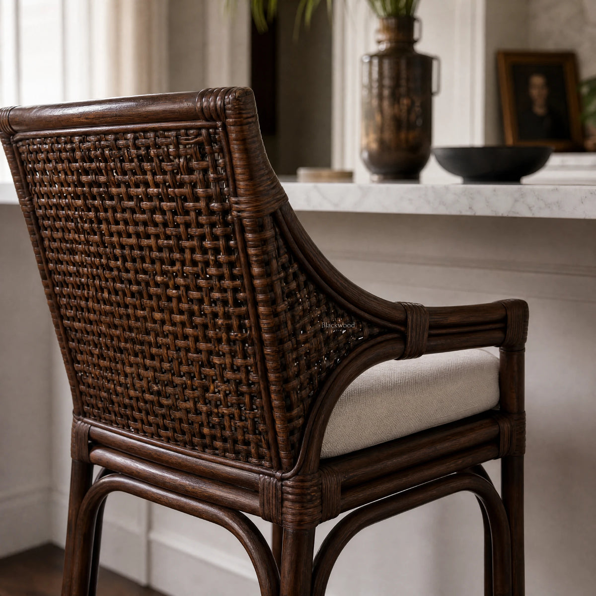 Havana Barstool handcrafted from natural rattan with a warm finish and cushioned seat.
