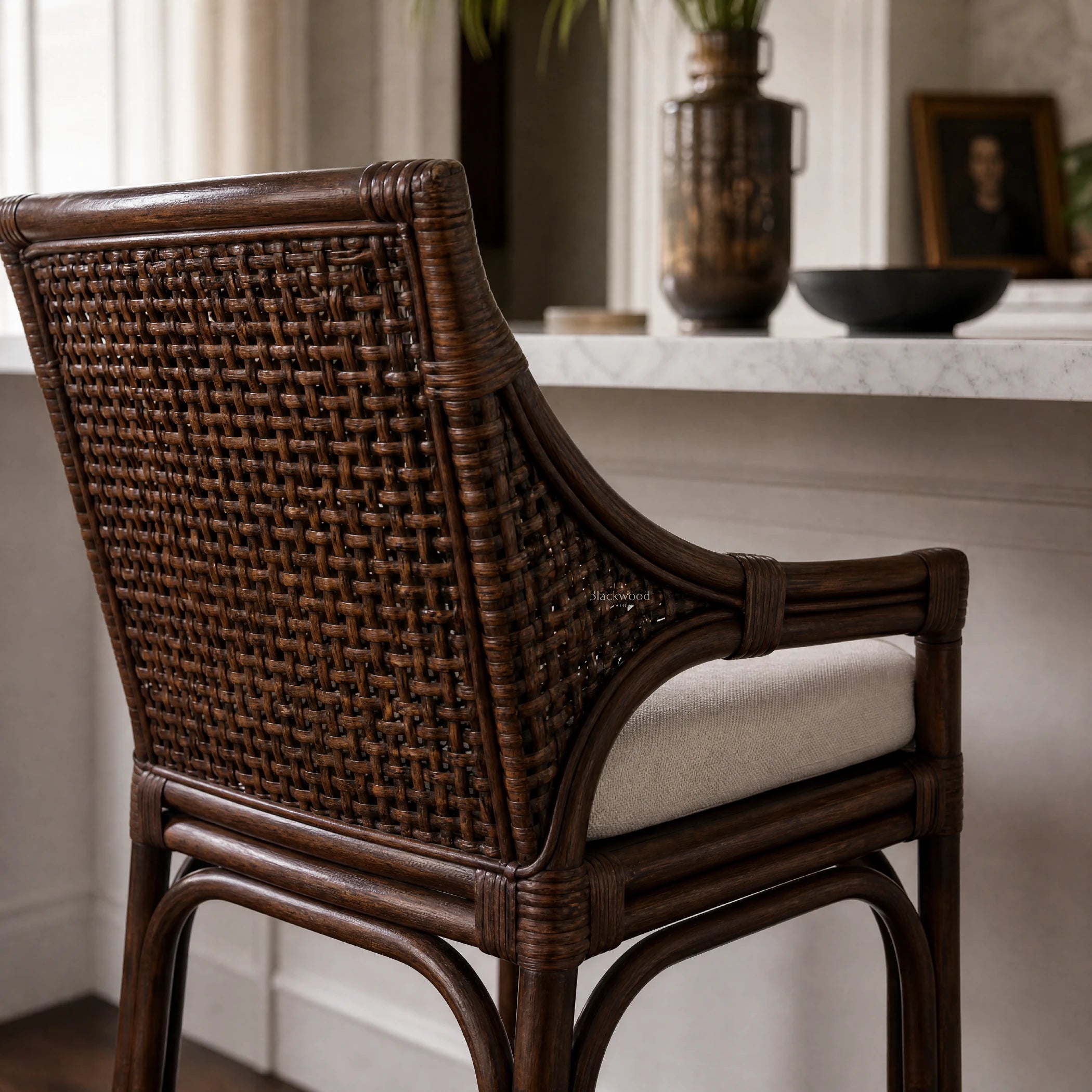 Havana Barstool handcrafted from natural rattan with a warm finish and cushioned seat.