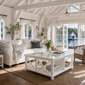 Harbour Coffee Table in solid timber with glass top, white coastal living room by the water.