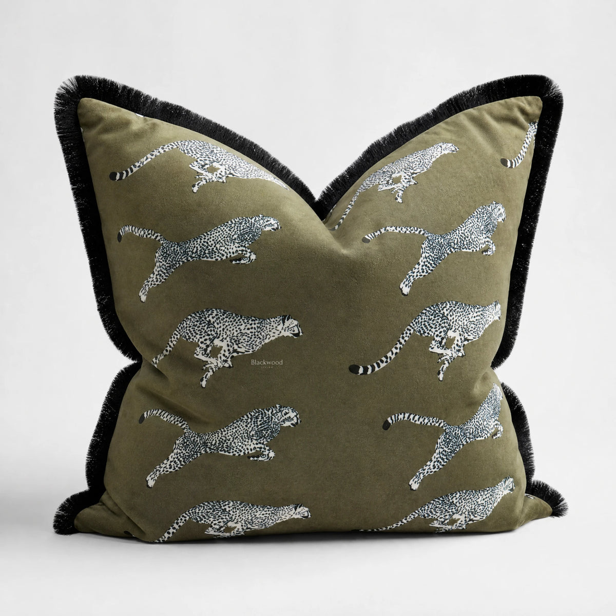 Leopard Velvet Cushion Cover 55cm: olive-green velvet with white leopard silhouettes and black fringe trim
