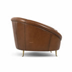 Pure Jane Leather Sofa in warm buffalo leather with brass legs.