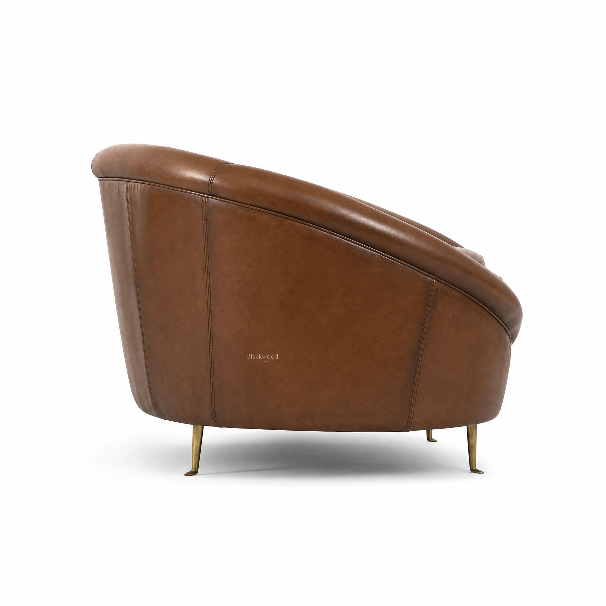 Pure Jane Leather Sofa in warm buffalo leather with brass legs.