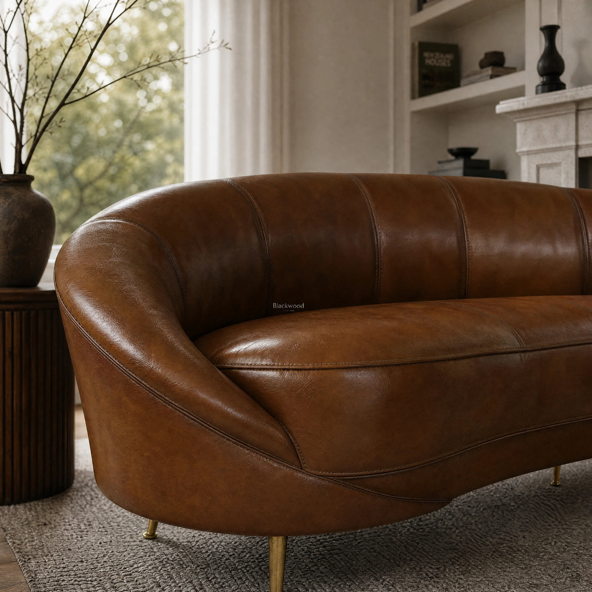 Pure Jane Leather Sofa in rich buffalo leather, hand coloured in Italy, crafted in Romania, curved armrest close-up