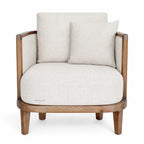 Seabrooke Chair with solid oak frame, handwoven natural rattan panels, and soft linen upholstery.