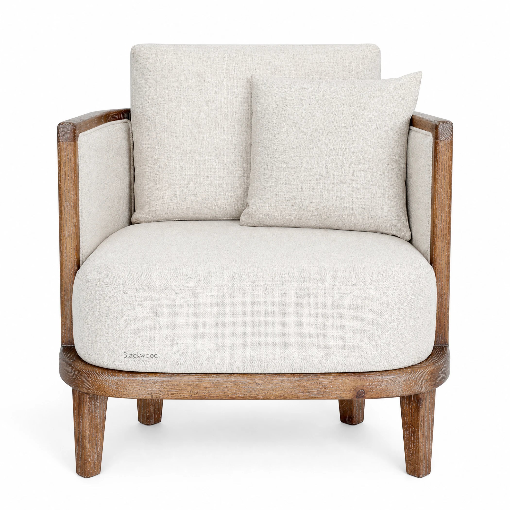 Seabrooke Chair with solid oak frame, handwoven natural rattan panels, and soft linen upholstery.