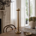 Foundry Candle Holder, 63cm tall, slender hand-finished aluminium with an aged metallic finish and white candle on top