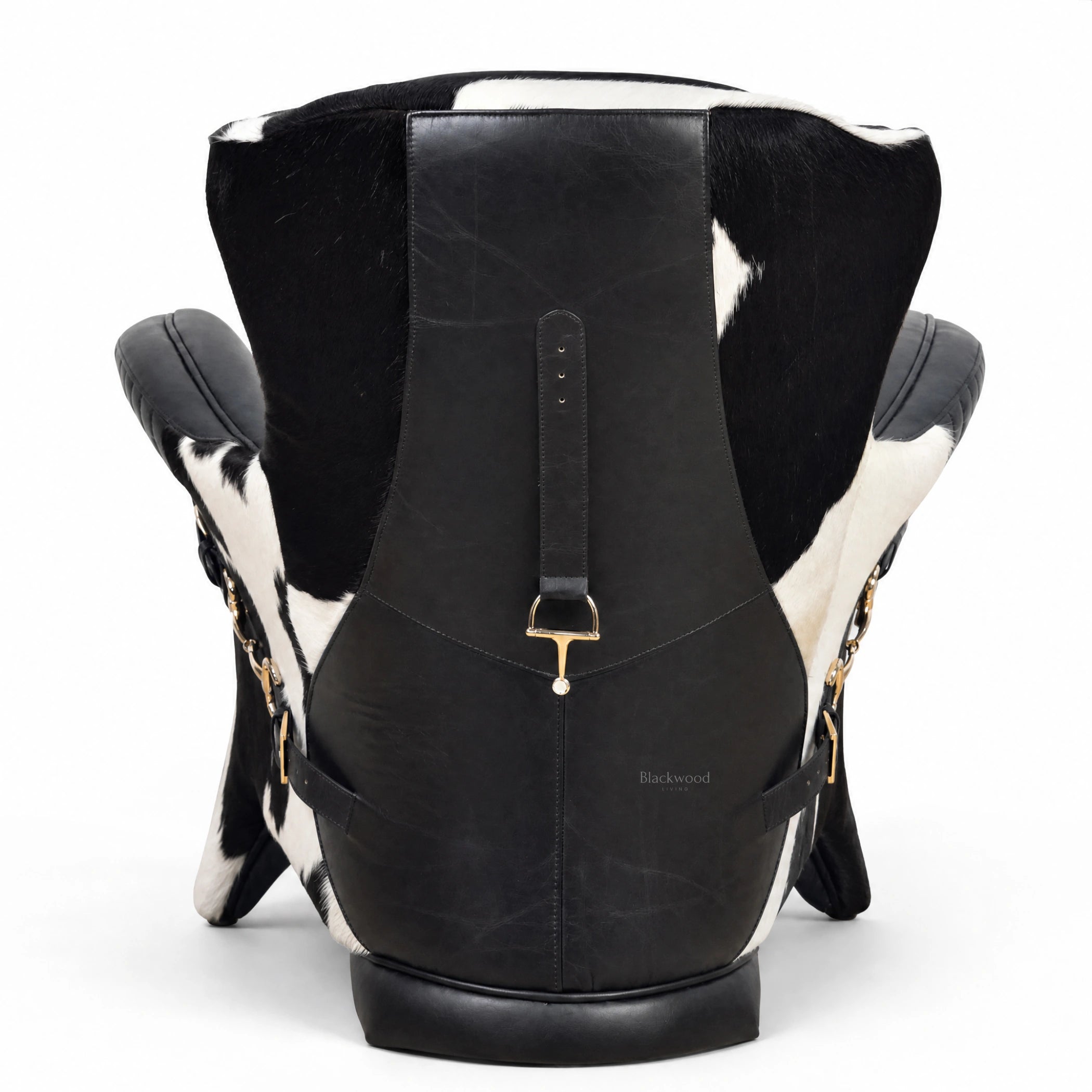 The Huntsman Chair in black South American leather with cowhide detailing and saddle-inspired straps.