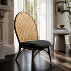 Triboa Bay® Forio Accent Chair with curved Gmelina wood frame and woven natural cane back, dark legs.