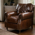 Classic brown leather Churchill armchair with rolled arms and antique brass nailhead trim