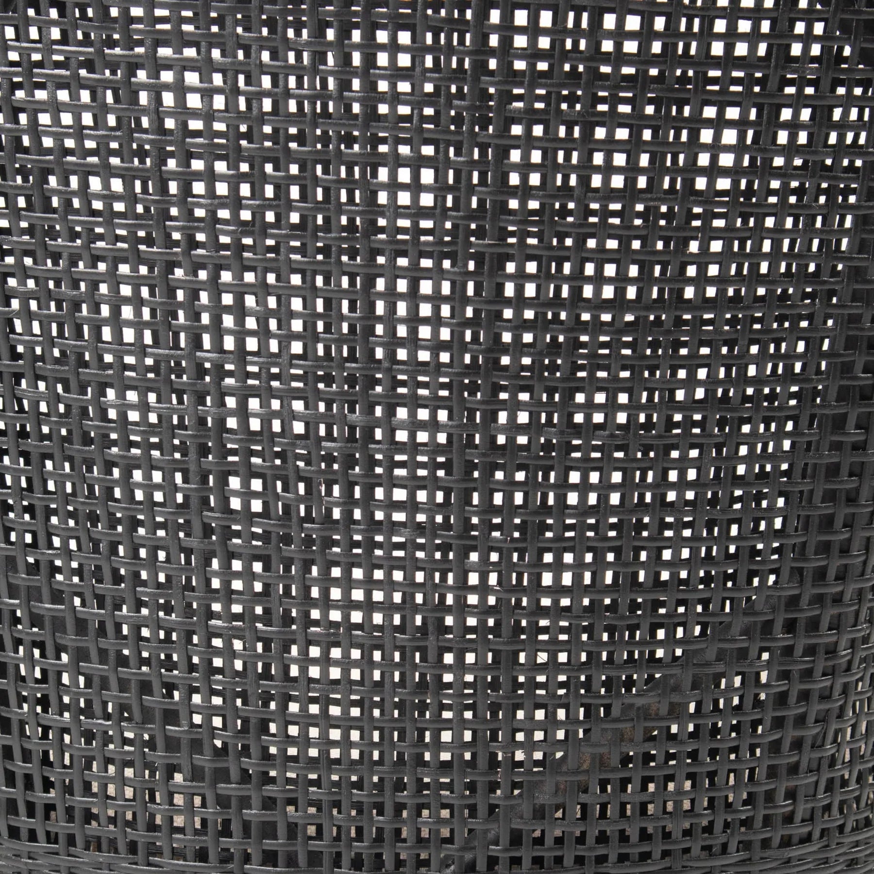 Close-up of dark woven rattan back on the Barbados Dining Chair